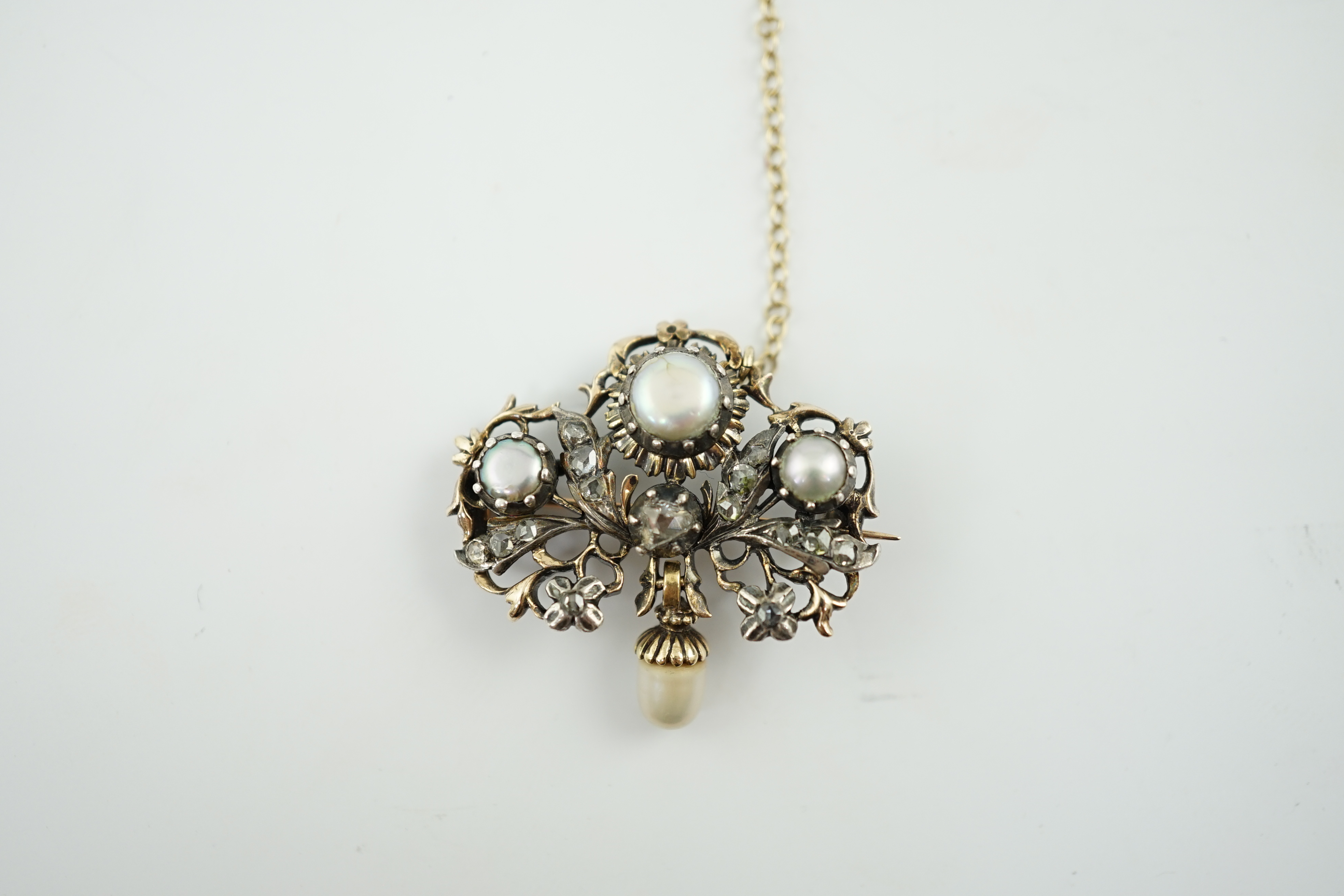 A Victorian gold and silver, button pearl and rose cut diamond cluster set drop brooch